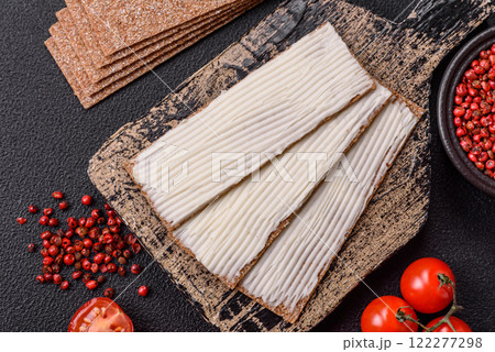 Rectangular whole grain crisp bread with cream cheese 122277298