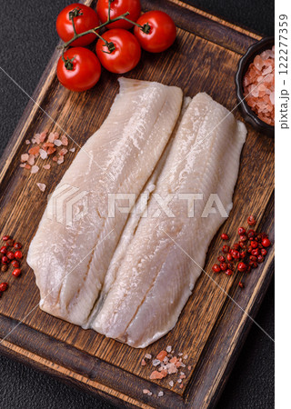 Herring fillet salted and marinated with salt, spices and oil 122277359