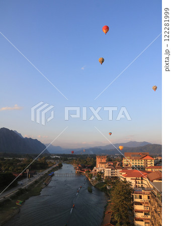 Hot air balloons over the Nam Song River, Vang Vieng, Laos. Hot air balloons over the Nam Song River, Vang Vieng, Laos. 122281999