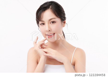 Beautiful young asian woman with clean fresh skin on white background, Face care, Facial treatment, Cosmetology, beauty and spa, Asian women portrait. Beautiful young asian woman with clean fresh skin on white background, Face care, Facial treatment, Cosmetology, beauty and spa, Asian women portrait. 122284458