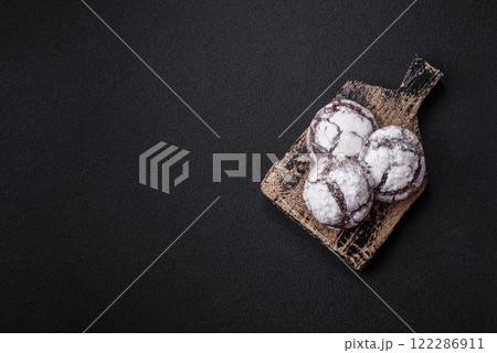 Sweet chocolate crinkle cookies made at home Sweet chocolate crinkle cookies made at home 122286911