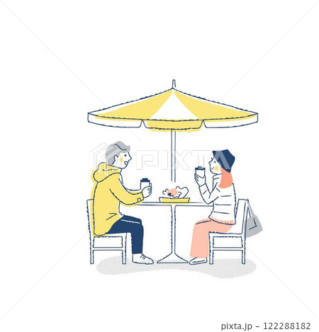 オープンカフェでくつろぐ冬服の若いカップル 122288182