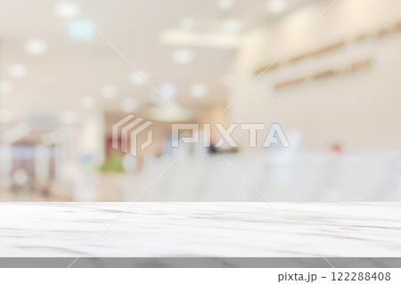 Marble table top with blur hospital clinic medical interior background Marble table top with blur hospital clinic medical interior background 122288408
