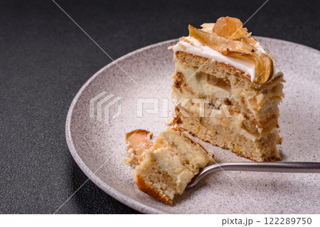 Layered sweet cake with cream, pear and dorblu cheese 122289750