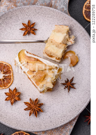 Layered sweet cake with cream, pear and dorblu cheese Layered sweet cake with cream, pear and dorblu cheese 122289758