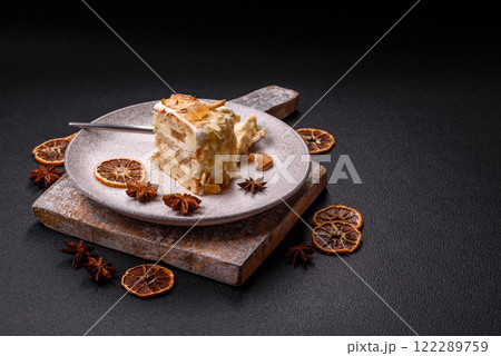 Layered sweet cake with cream, pear and dorblu cheese Layered sweet cake with cream, pear and dorblu cheese 122289759