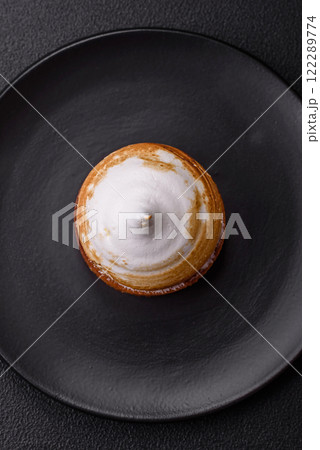 Sweet lemon tart with cream filling and zest Sweet lemon tart with cream filling and zest 122289774