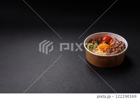 Boiled beef with vegetables, grains, seeds and spices 122290169