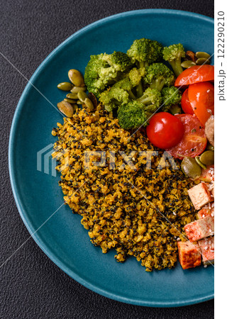 Quinoa bowl with tofu, steamed vegetables, grains, seeds and spices 122290210