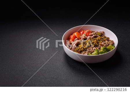 Quinoa bowl with tofu, steamed vegetables, grains, seeds and spices Quinoa bowl with tofu, steamed vegetables, grains, seeds and spices 122290216