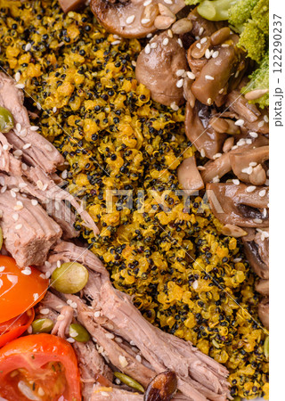 Quinoa bowl with tofu, steamed vegetables, grains, seeds and spices Quinoa bowl with tofu, steamed vegetables, grains, seeds and spices 122290237