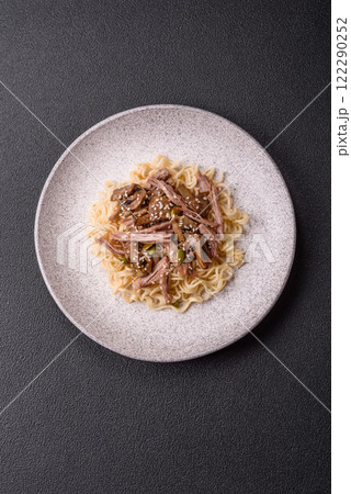 Rice noodles, asian food with soy sauce and spices Rice noodles, asian food with soy sauce and spices 122290252