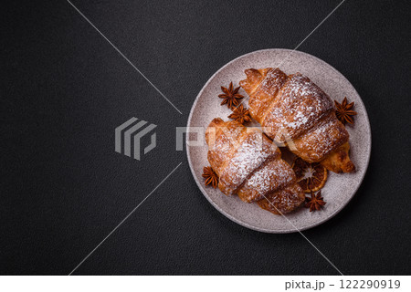 Fresh crispy sweet croissant with chocolate filling 122290919