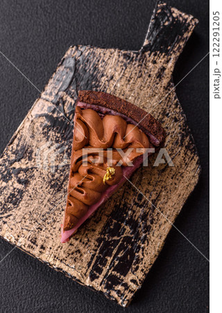 A piece of sweet cheesecake with mascarpone cheese, strawberry flavor 122291205