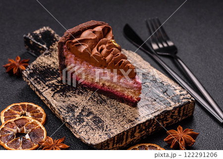 A piece of sweet cheesecake with mascarpone cheese, strawberry flavor 122291206