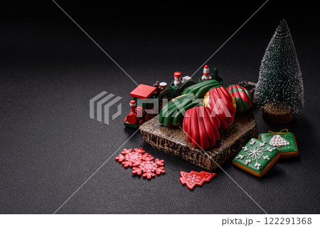 Sweet Madeleines desserts covered with chocolate in Christmas colors Sweet Madeleines desserts covered with chocolate in Christmas colors 122291368