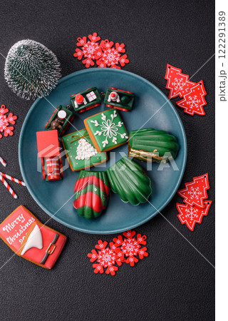 Sweet Madeleines desserts covered with chocolate in Christmas colors Sweet Madeleines desserts covered with chocolate in Christmas colors 122291389