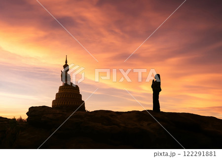 Buddhism, Buddha statues, worship and the morning sunlight Buddhism, Buddha statues, worship and the morning sunlight 122291881