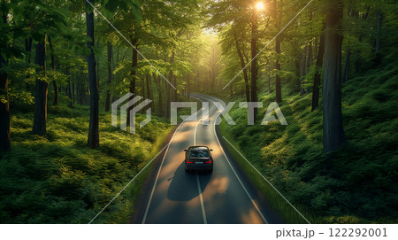 A car driving on a winding forest road...のイラスト素材 [122292001] - PIXTA