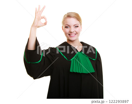 Law. Woman lawyer in polish gown showing ok okay. Law. Woman lawyer in polish gown showing ok okay. 122293897