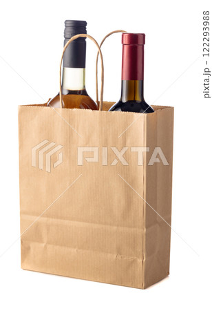 Bottles of red and white wine in paper bag isolated on a white background. Bottles of red and white wine in paper bag isolated on a white background. 122293988