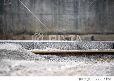 Construction foundation for pavement of a sidewalk Construction foundation for pavement of a sidewalk 122295168