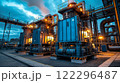 Industrial power generators illuminated at dusk in a facility. Generative AI 122296487