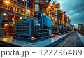 Industrial machinery operates at twilight in a power plant. Generative AI 122296489