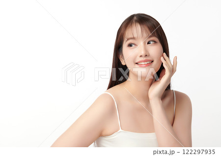 Beautiful young asian woman with clean fresh skin on white background, Face care, Facial treatment, Cosmetology, beauty and spa, Asian women portrait. Beautiful young asian woman with clean fresh skin on white background, Face care, Facial treatment, Cosmetology, beauty and spa, Asian women portrait. 122297935