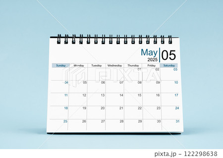 May 2025 Monthly desk calendar for 2025 year on soft blue background. May 2025 Monthly desk calendar for 2025 year on soft blue background. 122298638