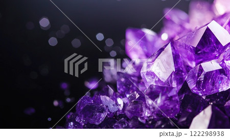 Violet Crystals Reflecting Light on Dark Surface Violet Crystals Reflecting Light on Dark Surface 122298938