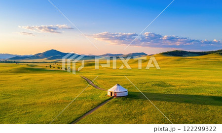 Mongolian yurts set against vast plains 122299322
