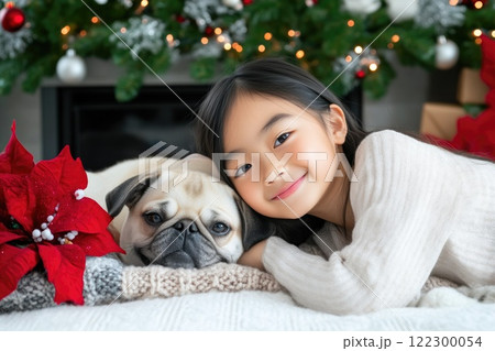 Pug and Child Snuggling by the Cozy Fireplace 122300054