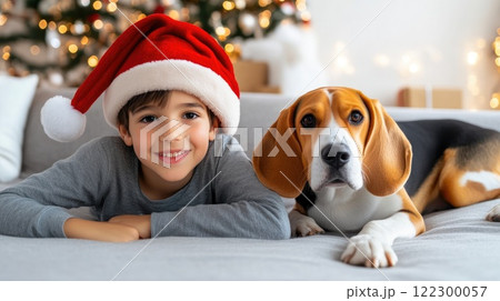 Child and Beagle Snuggling on a Christmas Evening 122300057