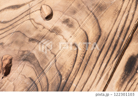 Production of a wooden table from an array of Karagach. Wood Slabs. Exclusive home table, solid wood slab, wood texture background. 122301103