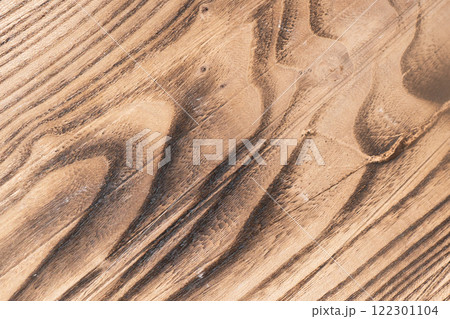 Production of a wooden table from an array of Karagach. Wood Slabs. Exclusive home table, solid wood slab, wood texture background. 122301104