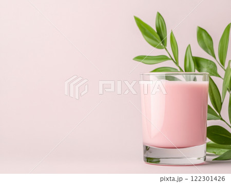 glass of fresh pink drink 122301426