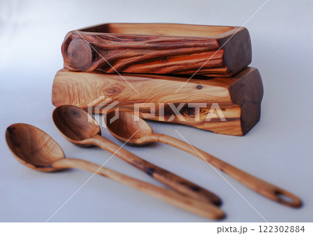 Wooden kitchen utensils stacked view close up Wooden kitchen utensils stacked view close up 122302884