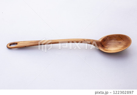 Wooden kitchen utensils stacked view close up isolated 122302897