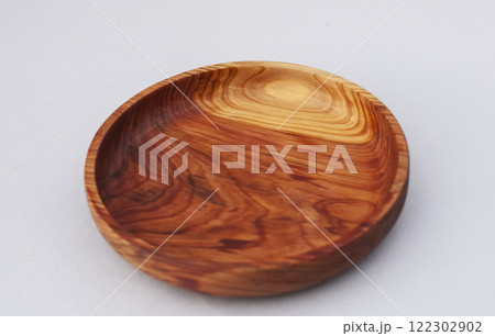 Wooden kitchen utensils stacked view close up isolated Wooden kitchen utensils stacked view close up isolated 122302902