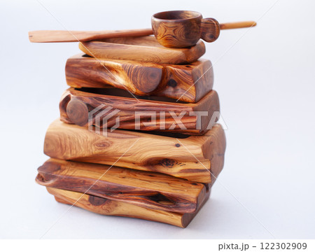 Wooden kitchen utensils stacked view Wooden kitchen utensils stacked view 122302909