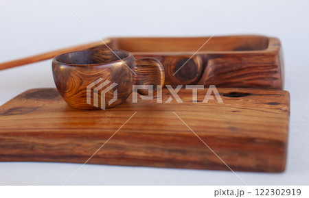 Wooden kitchen utensils stacked view Wooden kitchen utensils stacked view 122302919