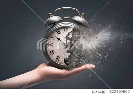 clock shatters into particles, concept of passing time 122303609