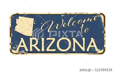Welcome to Arizona. A worn blue plaque with the name and outline of the state. Welcome inscription on the road sign Welcome to Arizona. A worn blue plaque with the name and outline of the state. Welcome inscription on the road sign 122304529