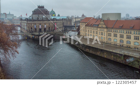 Ukrainian flags over the Bode-Museum in Berlin and Spree river  and Fernsehturm 122305457