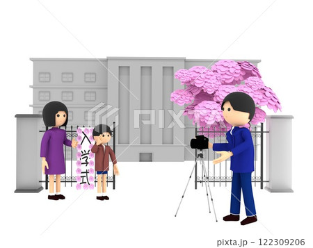 桜が咲く小学校の入学式。校門の前に立ち、記念写真を撮影する親子 122309206