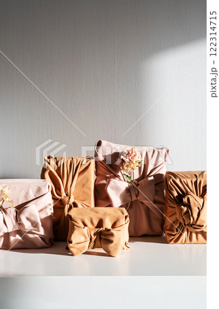 Gifts wrapped in sustainable fabric. Gifts wrapped in sustainable fabric. 122314715