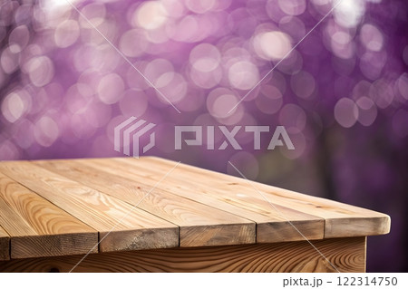 Photorealistic image of a wooden table top with a blurred background of a bright, sunny forest Photorealistic image of a wooden table top with a blurred background of a bright, sunny forest 122314750
