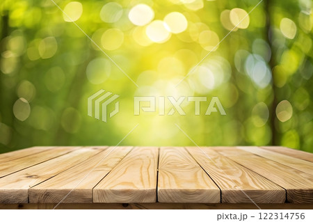 Photorealistic image of a wooden table top with a blurred background of a bright, sunny forest 122314756