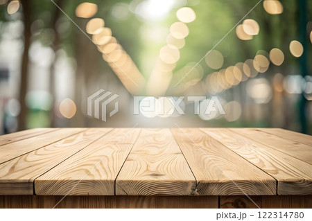 Photorealistic image of a wooden table top with a blurred background of a bright, sunny forest Photorealistic image of a wooden table top with a blurred background of a bright, sunny forest 122314780